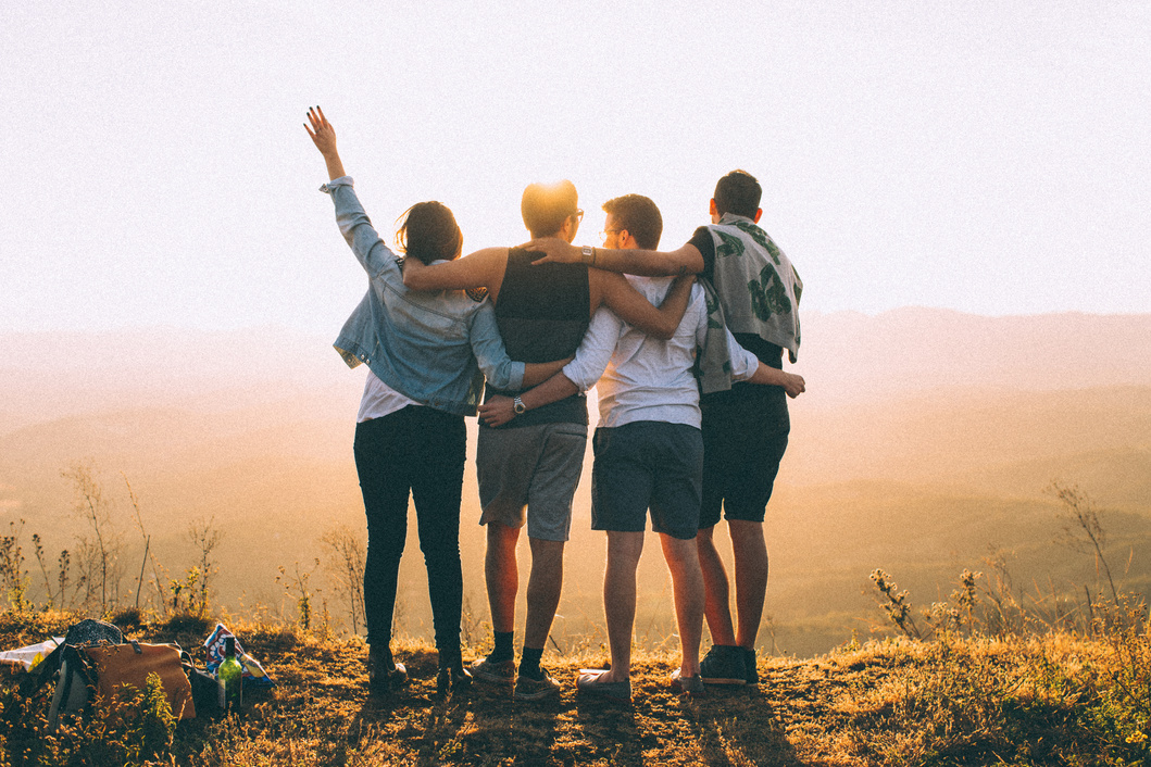 Friends standing together outdoors